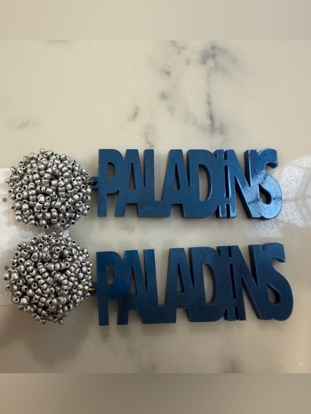 PALADINS Blue Drop Earrings and baseball hat